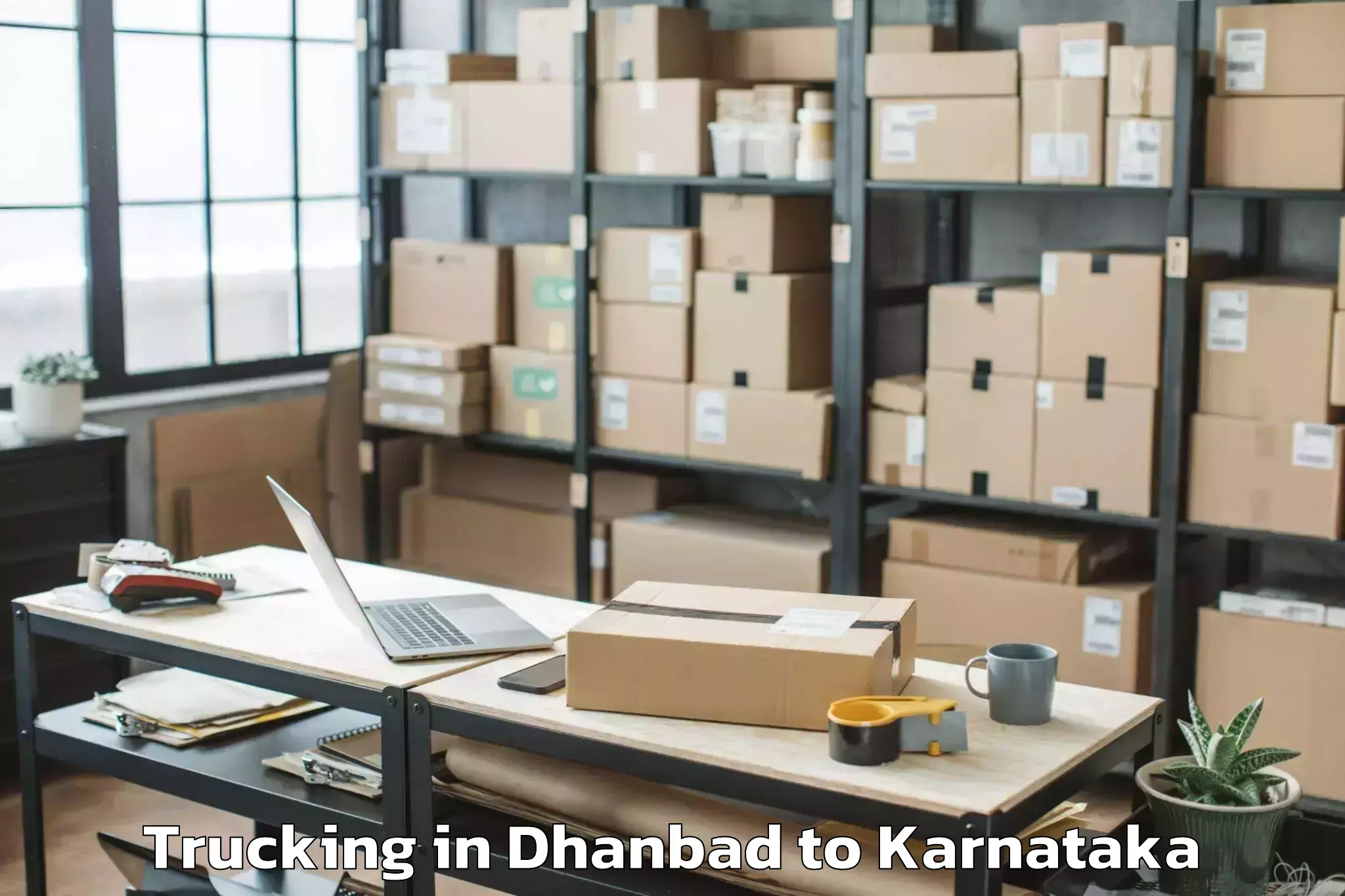 Get Dhanbad to Koppa Trucking